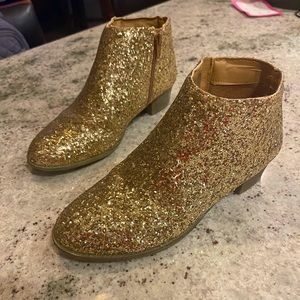 Selling gold boots for women
